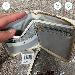 Brand new coach wallet. I got it as a graduation gift and it’s not my style.
